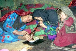 Women with her 2 daughters smoking opium 